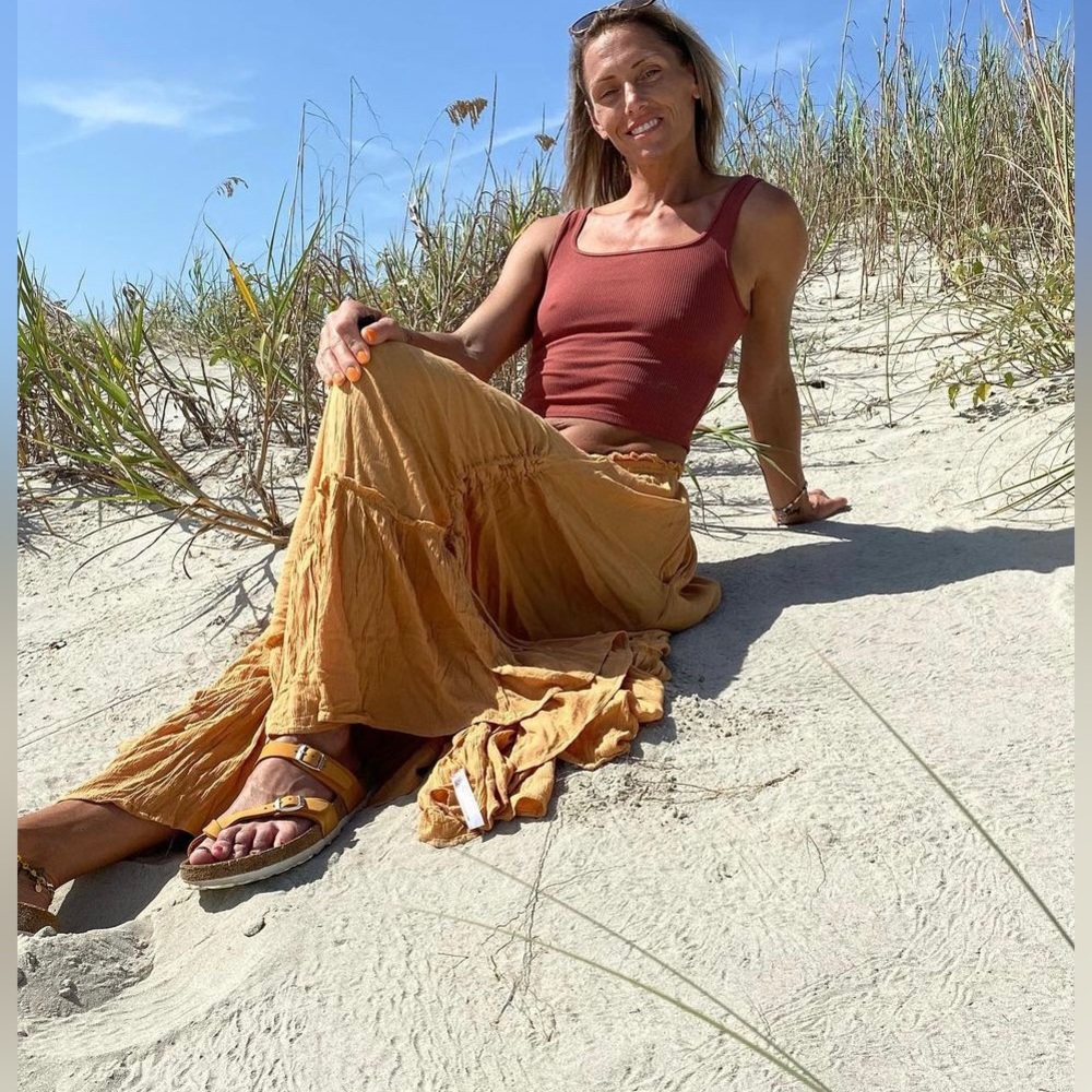 2 in 1 long skirt or dress, has adjustable strings on each side.